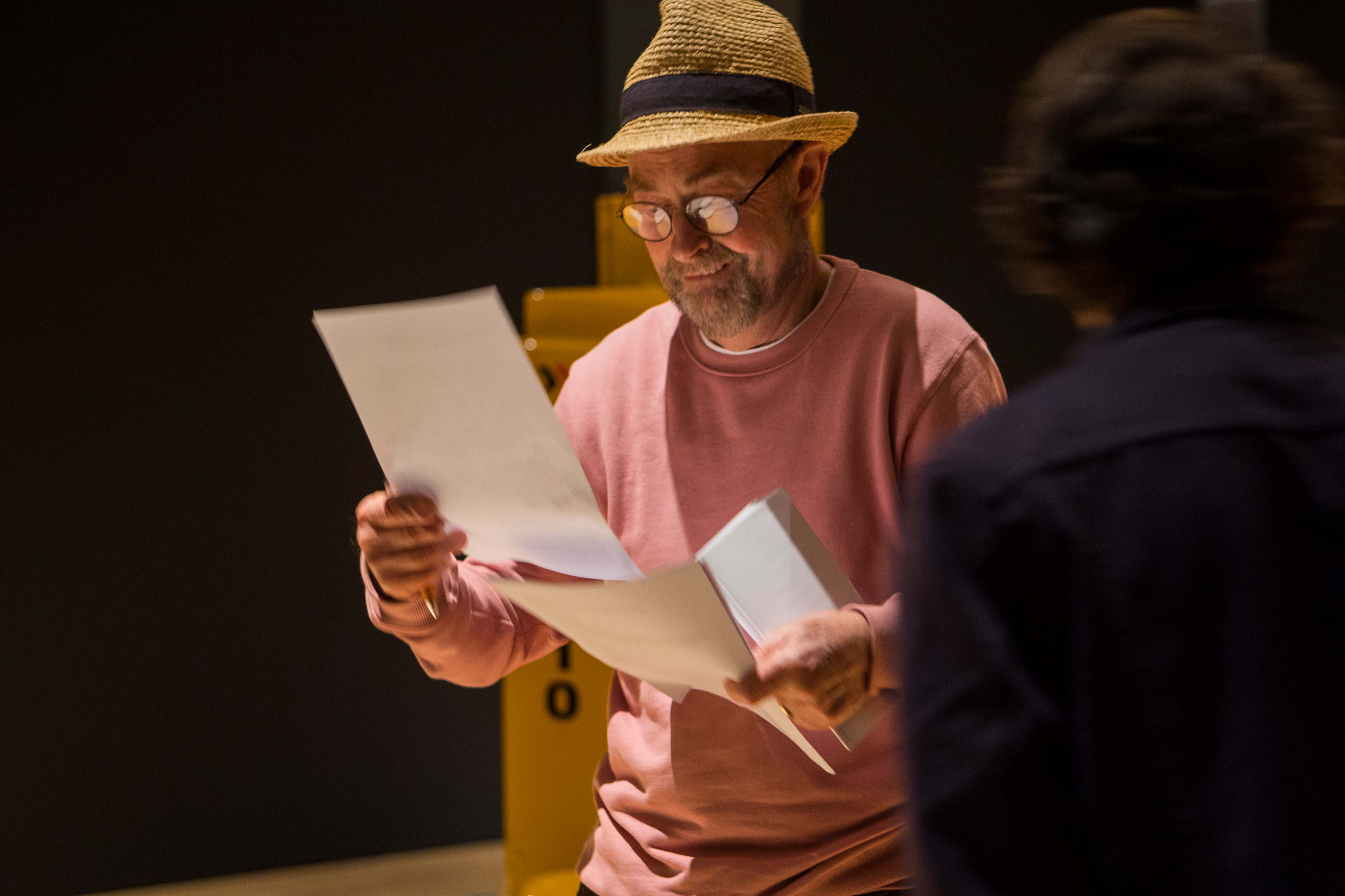 A photograph of sculptor and former Len Lye Foundation Director Evan Webb, during the install of an exhibition of Len's work at the Museum Tinguely in Basel, Switzerland, in 2019.
